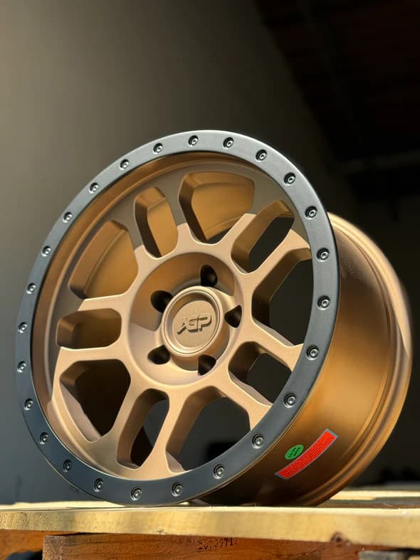 AGP 17x9 AGP Trux 301 5x127 5x5 Bronze w/Black ring (-12mm)